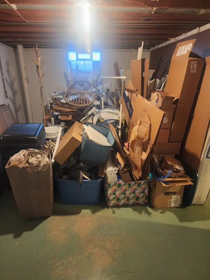 Roll-off dumpster container at job site for Concrete Dumpster Rental in Garden City